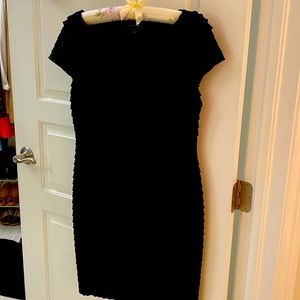 Cocktail dress with tiered ruffles.  Black with cap sleeves.